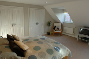 Bathroom and bedroom in loft conversion
